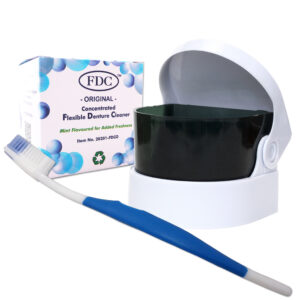 Flexible denture cleaner, sonic dental bath and silicone bristled toothbrush