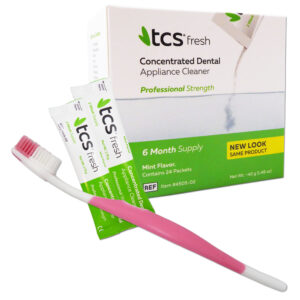 TCS denture cleaner and pink silicone bristled toothbrush