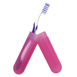 Pink translucent case with a manual toothbrush inside