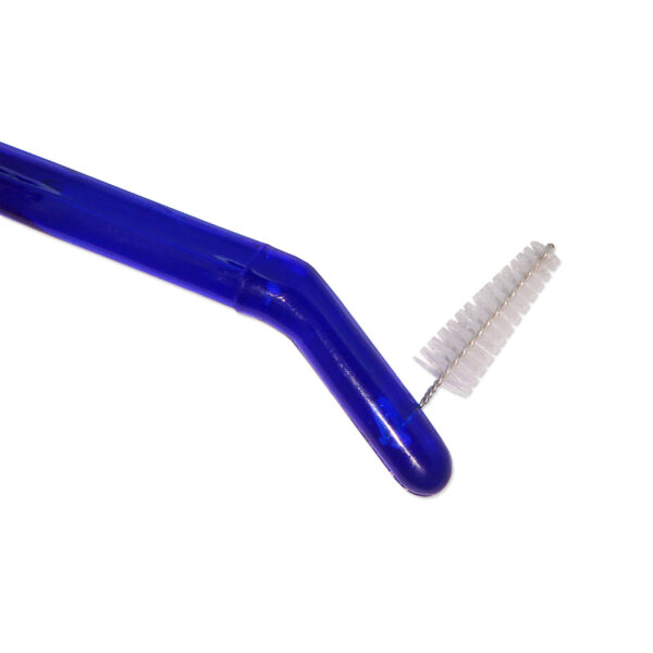 Orthodontic toothbrush interdental end
