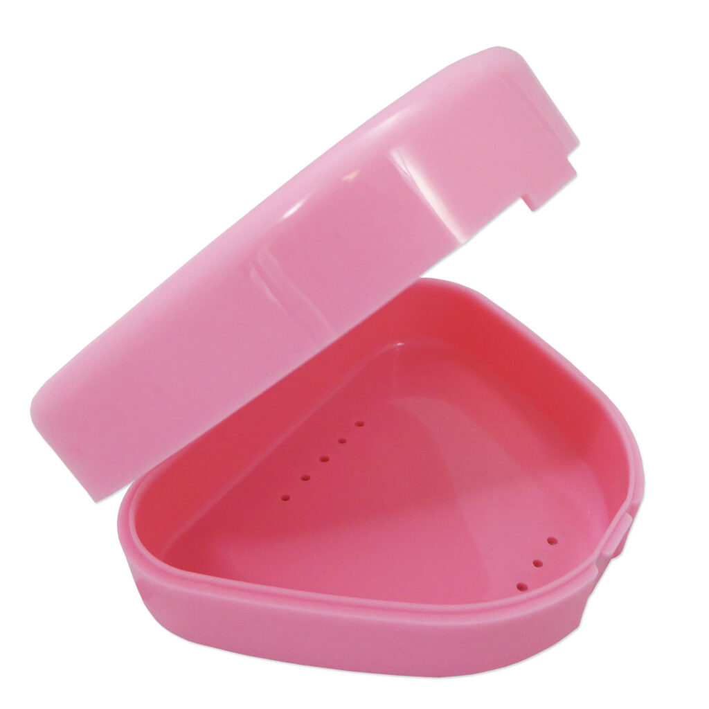 Baby pink retainer case, open with ventilation holes in base.