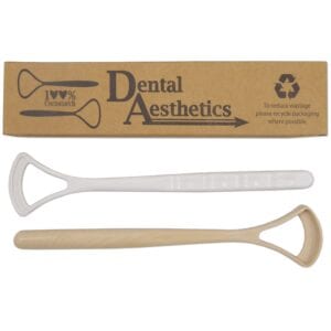 Set of 2, 100% Cornstarch tongue scrapers, 1 White and 1 Beige in cardboard packaging.