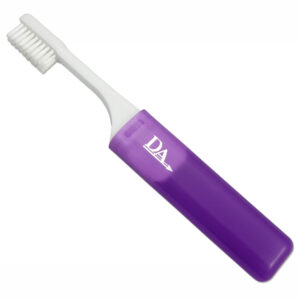 Purple Orthodontic travel toothbrush with V‑trim bristles and fold‑away handle, for cleaning around braces.