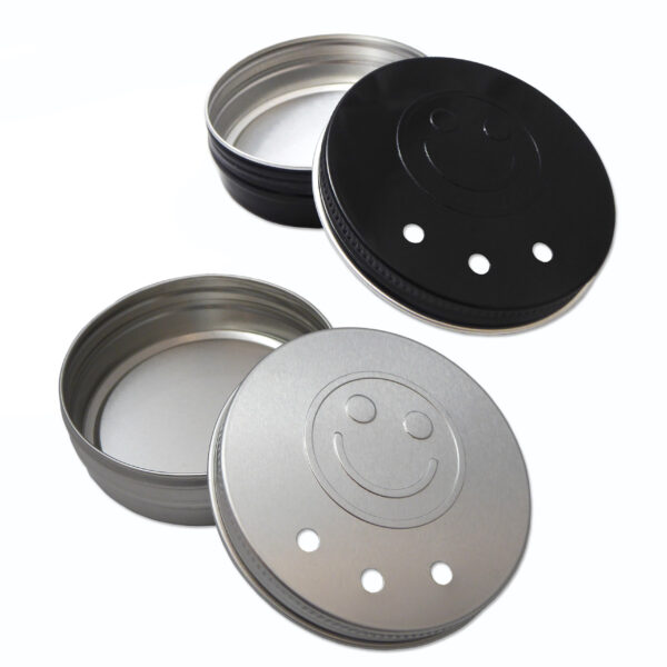 Metal retainer cases with smiley face embossed on lid.